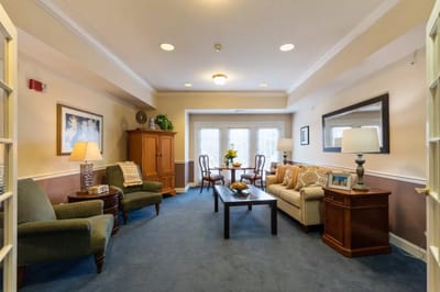 Bright common area with seating and decor