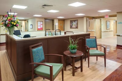 Bright facility lobby with seating and reception area