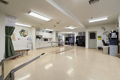 Interior view of a rehabilitation room with equipment