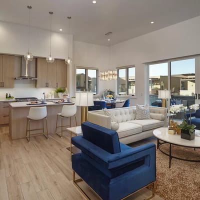 Bright and modern common area with seating and kitchen