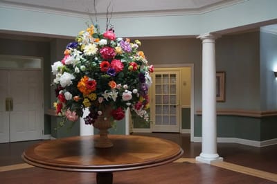 Vibrant floral arrangement in a facility common area