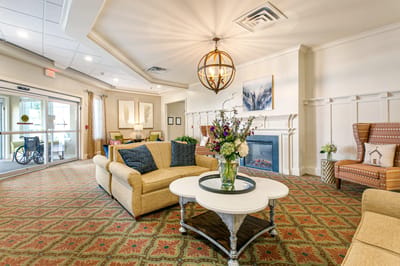 Bright interior common area with seating and decor