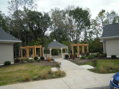 Outdoor gazebo in a landscaped garden area