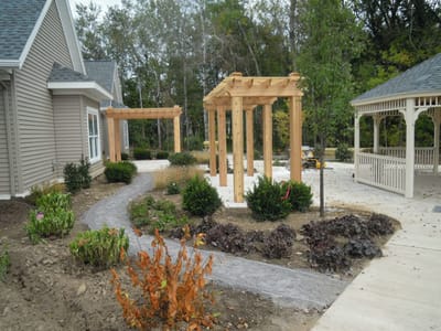 Outdoor garden area with pathways and structures