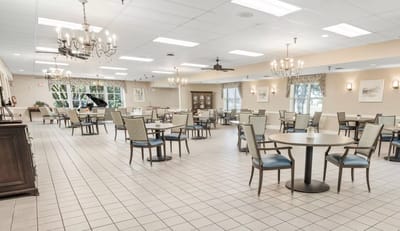 Bright interior dining room with tables and chairs