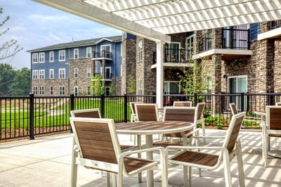 Outdoor seating area with a view of the facility