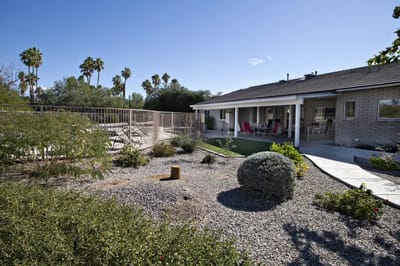 Exterior view of a senior care facility with outdoor space