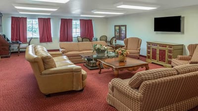 Bright common area with seating and decor
