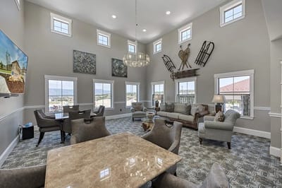 Well-lit common area with seating and decor