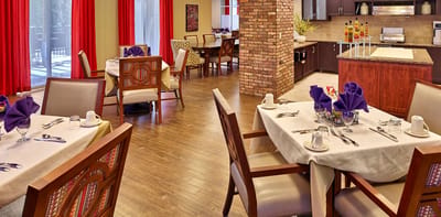 Dining area with tables set for a meal