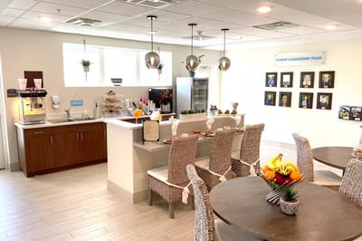Bright common area with snacks and seating