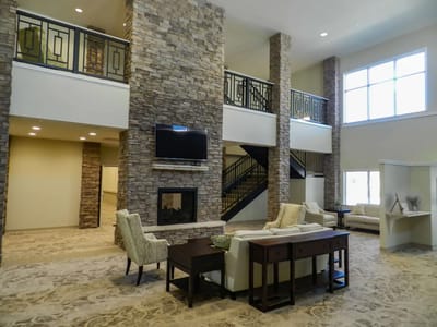 Interior common area with seating and fireplace
