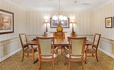 Elegant dining area with a wooden table and chairs