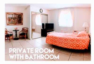 A private resident room with a bed and bathroom