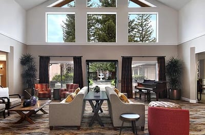 Bright and welcoming lounge area with large windows