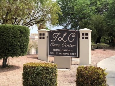 Signage for TLC Care Center in a landscaped area