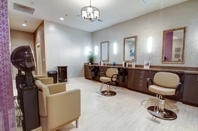 Salon and beauty area with chairs and mirrors