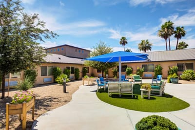 Outdoor courtyard with seating and shade