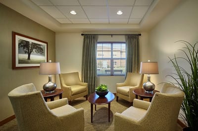Cozy common area with seating and natural light