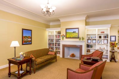 Cozy common area with bookshelves and seating