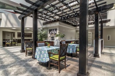 Bright common area with tables and seating