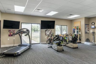 Interior view of a fitness room with exercise equipment