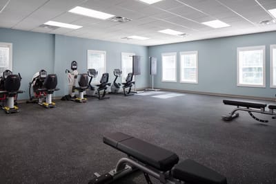 Interior view of a fitness area with workout machines