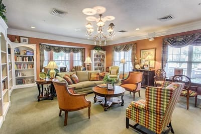 Common area with seating and bookshelves