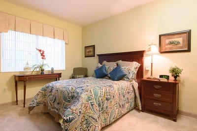 Cozy resident room with colorful bedding and décor
