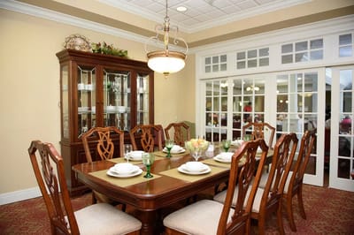 Dining room set up for a meal with elegant decor
