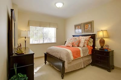 Cozy private bedroom with light decor and natural light