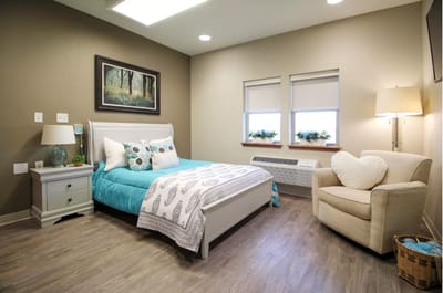 Comfortable private room with bed and seating area