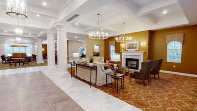 Interior view of a stylish common area with seating