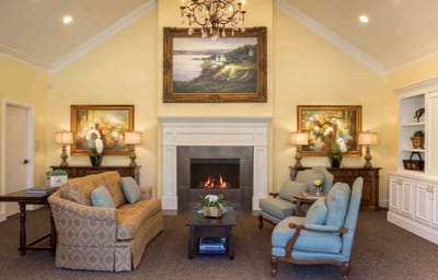 Cozy common area with comfortable seating and a fireplace