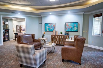 Cozy common area with comfortable seating and artwork