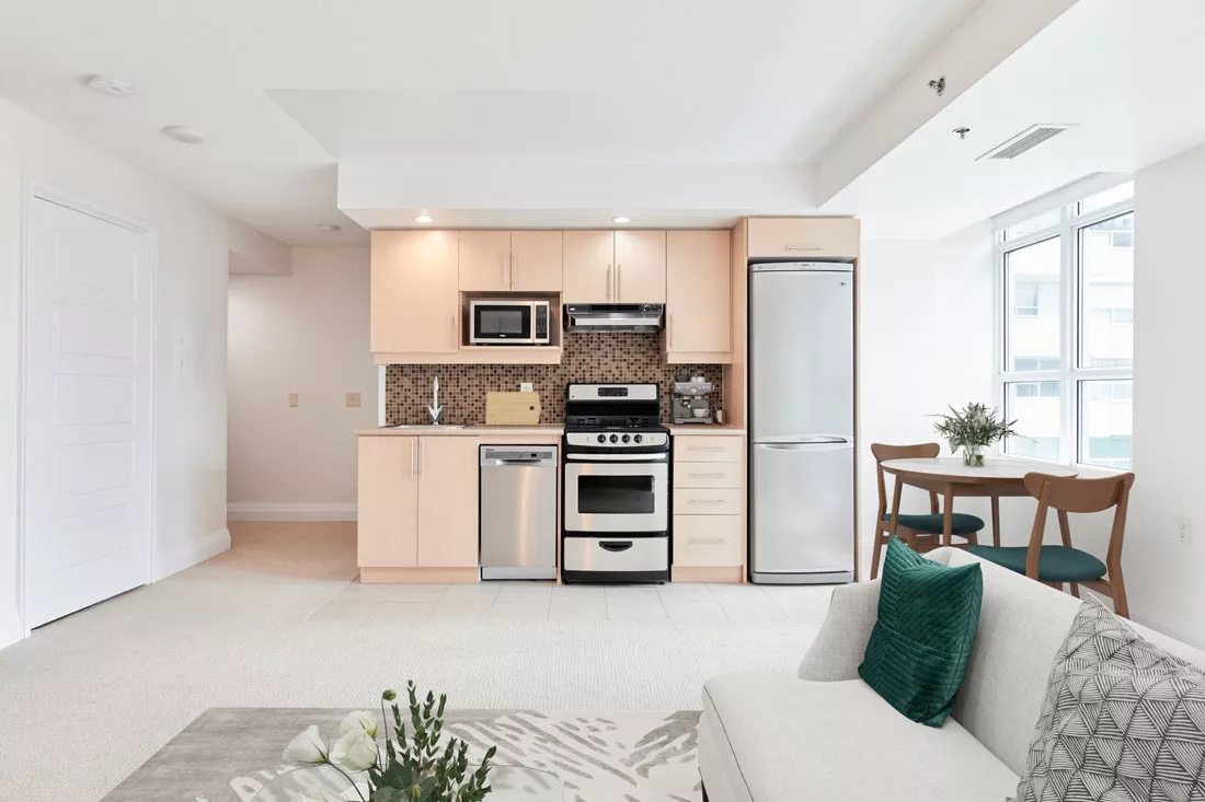 Modern kitchen and living area in a retirement residence