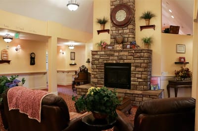 Cozy common area with a fireplace and seating