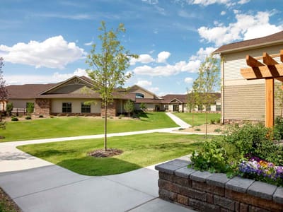 Well-maintained outdoor area with green spaces and pathways