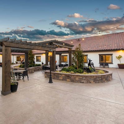 Outdoor courtyard with seating and landscaping