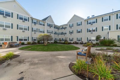 Outdoor courtyard with seating and landscaping