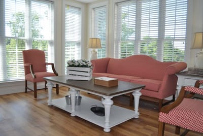 Bright interior living area with seating and decor