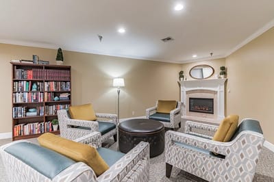 Cozy common area with seating and fireplace