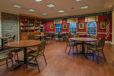 Bright common area with tables and chairs