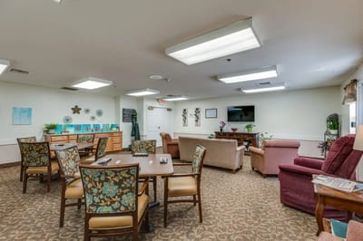 Bright common area with seating and decor