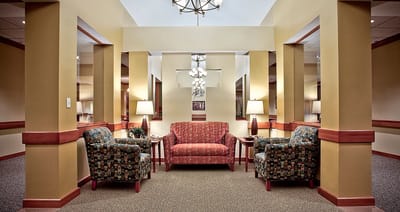 Interior seating area with comfortable chairs and a sofa