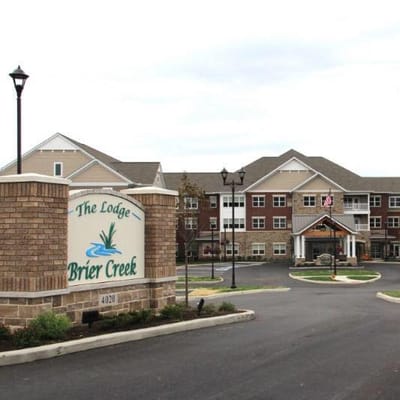 Entrance and sign of The Lodge at Brier Creek