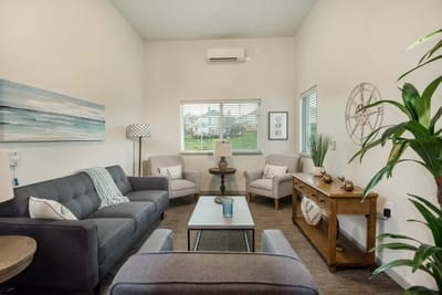 Bright sitting area with comfortable furniture