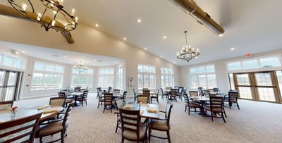 Dining room with tables and chandeliers