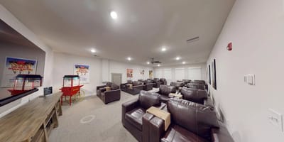 Common area with seating and entertainment options
