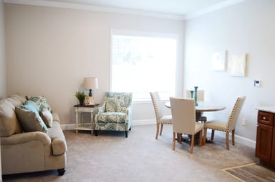 Cozy interior living space with seating and dining area